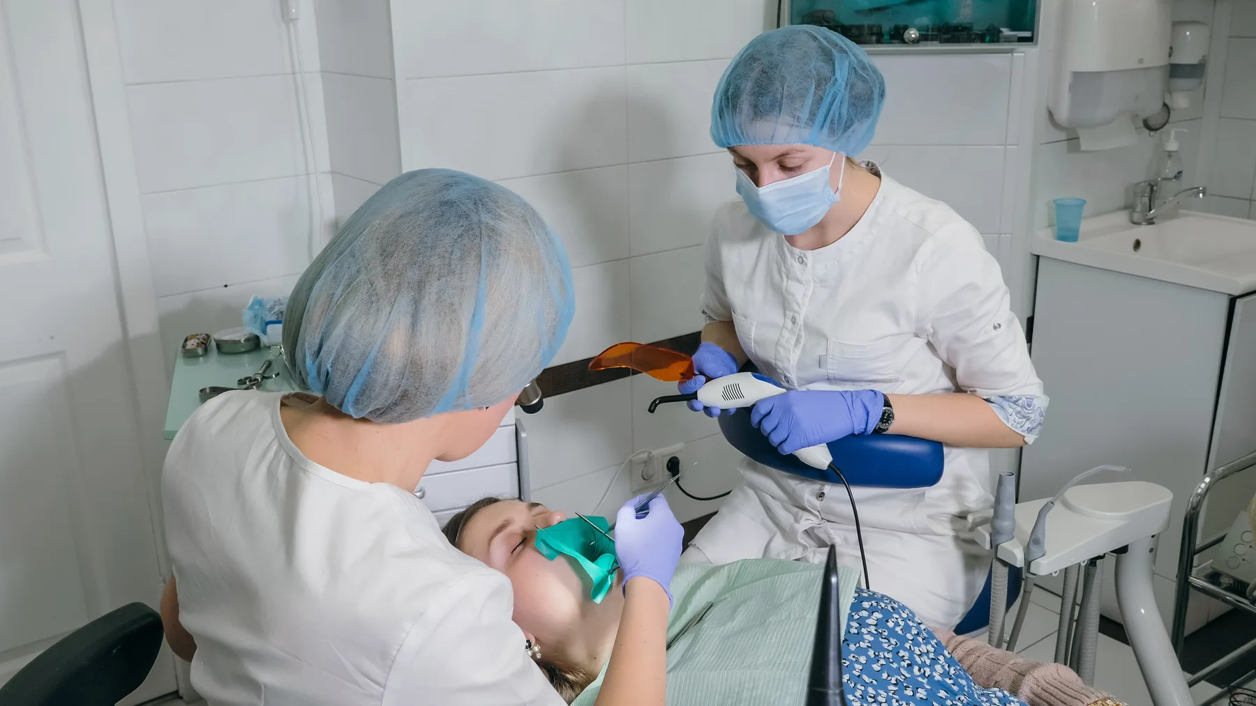 Composite restoration being cured during cavity treatment