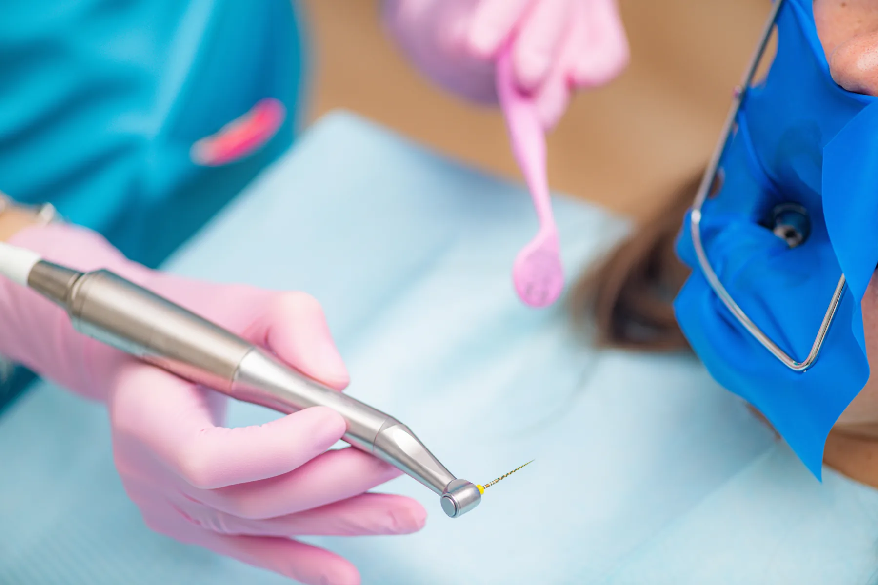 Endodontist preparing a patient for root canal treatment